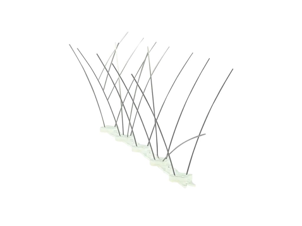 Duivenpinnen om duiven van het dak te weren